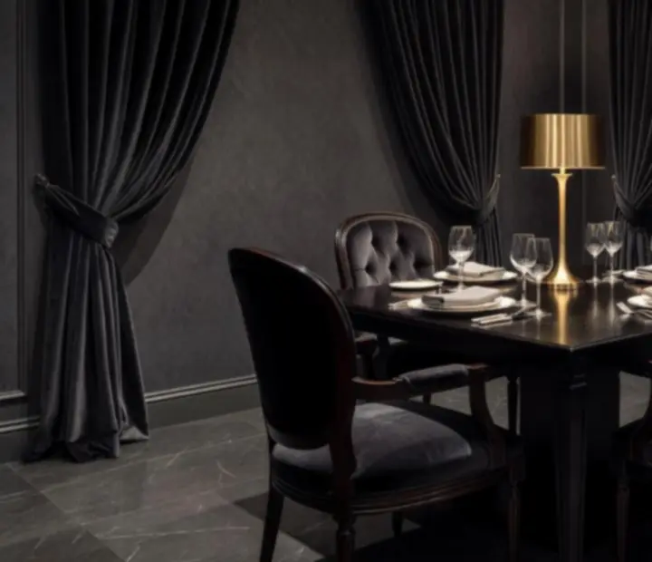 Luxusní privátní dining suite s měkkým osvětlením a sametovým sezením.